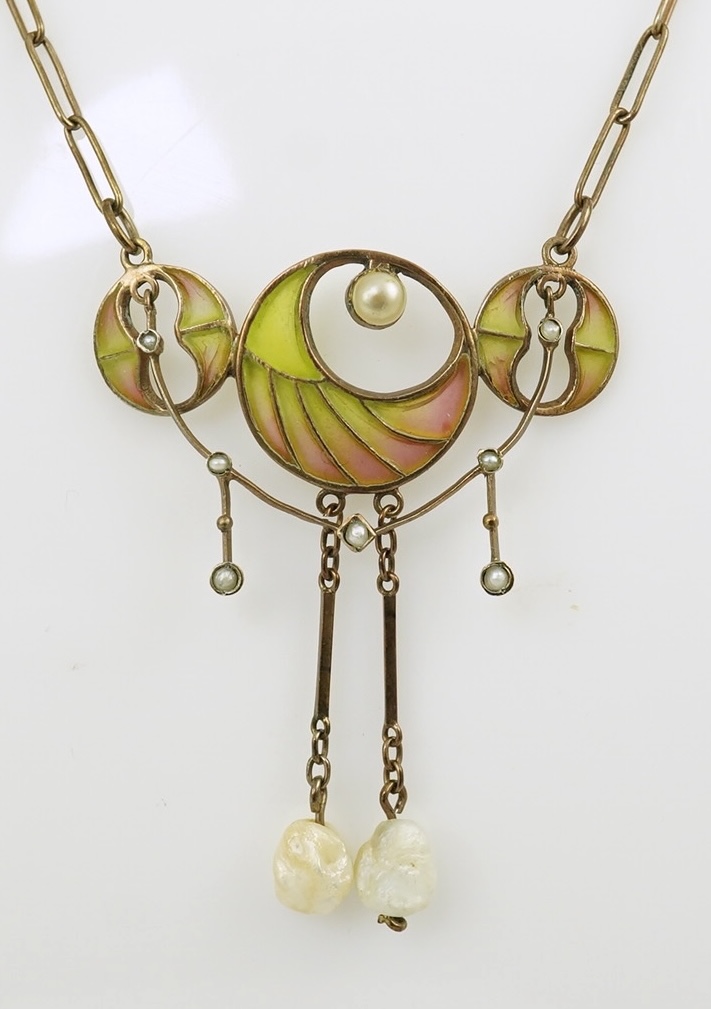 An early 20th century French silver gilt, baroque and seed pearl set plique a jour enamel pendant necklace